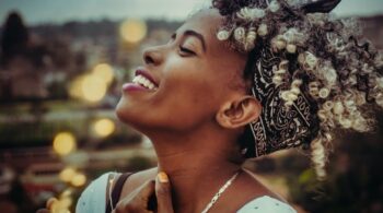 Smiling woman representing spirit in human bodies